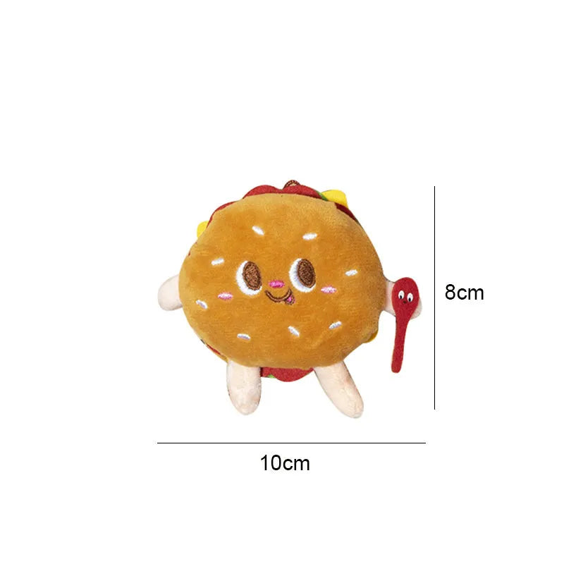 Assortment of kitten teething toys shaped like a hamburger, chicken leg, bread, fries, and hot dog.
