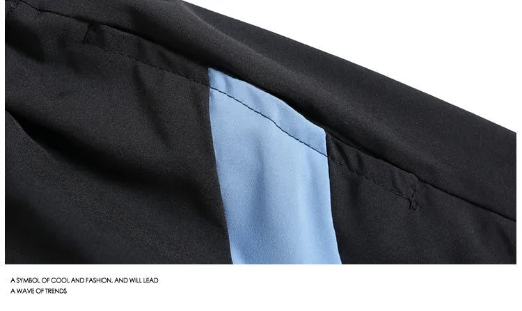 Men's loose-fit quick-dry training shorts in black with elastic waistband and straight-leg cut.