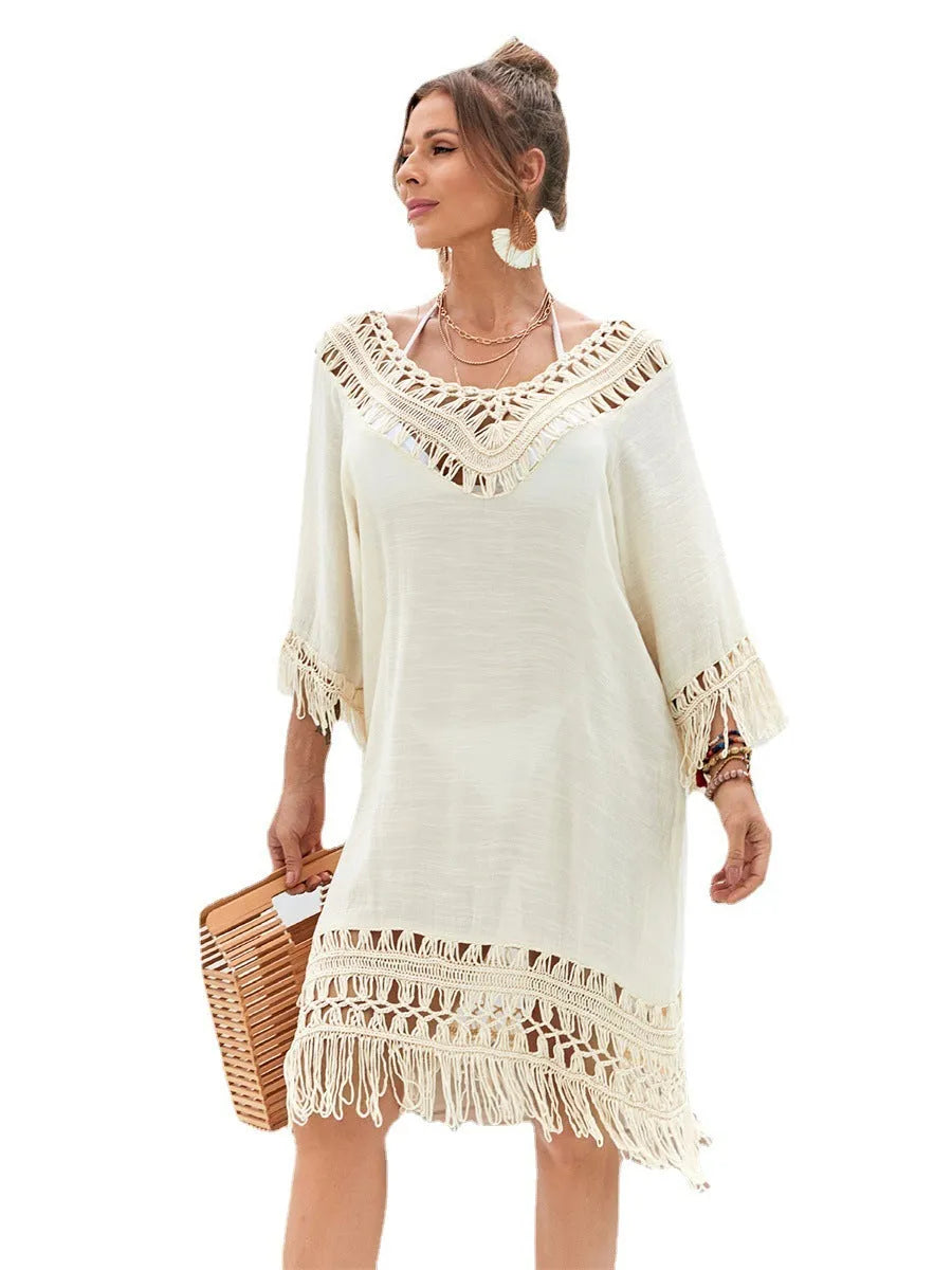 Women's apricot coloured hand-crocheted beach dress with loose free size fit for swimming.