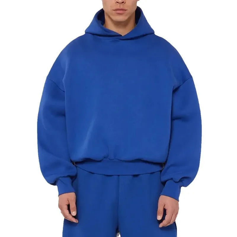 Men's grey fleece-lined cotton pullover hoodie with a wool lining and threaded long sleeves.