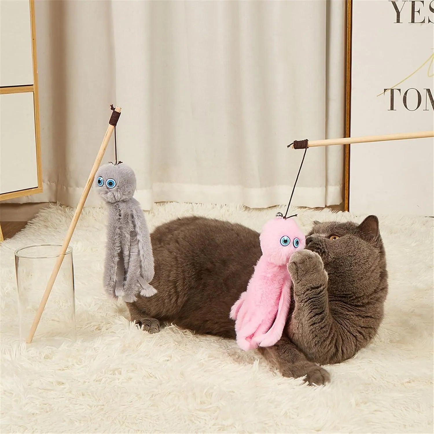 Furry octopus cat toy attached to long stick for interactive indoor play with kittens