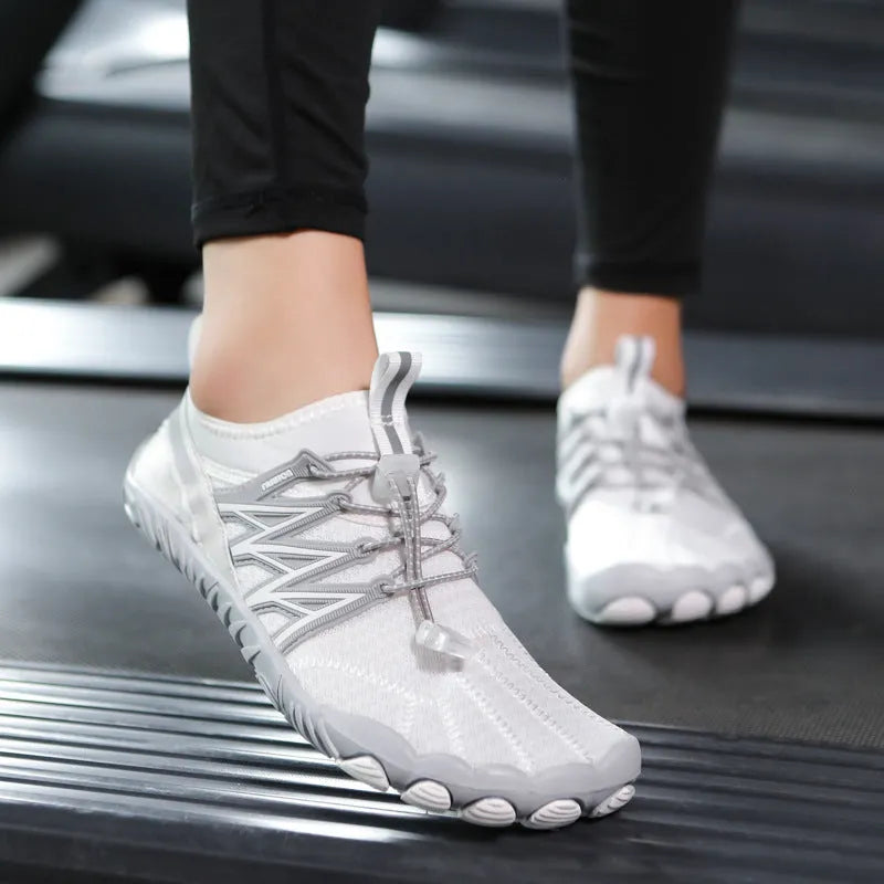 Lightweight training sneakers with striped pattern and non-slip rubber sole shown in multiple colour options.