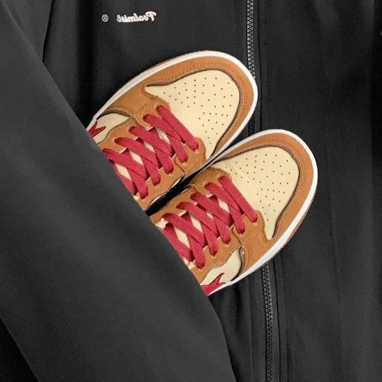 Brown women's low-top platform sneakers with sequin trim and round toe, shown from the side.