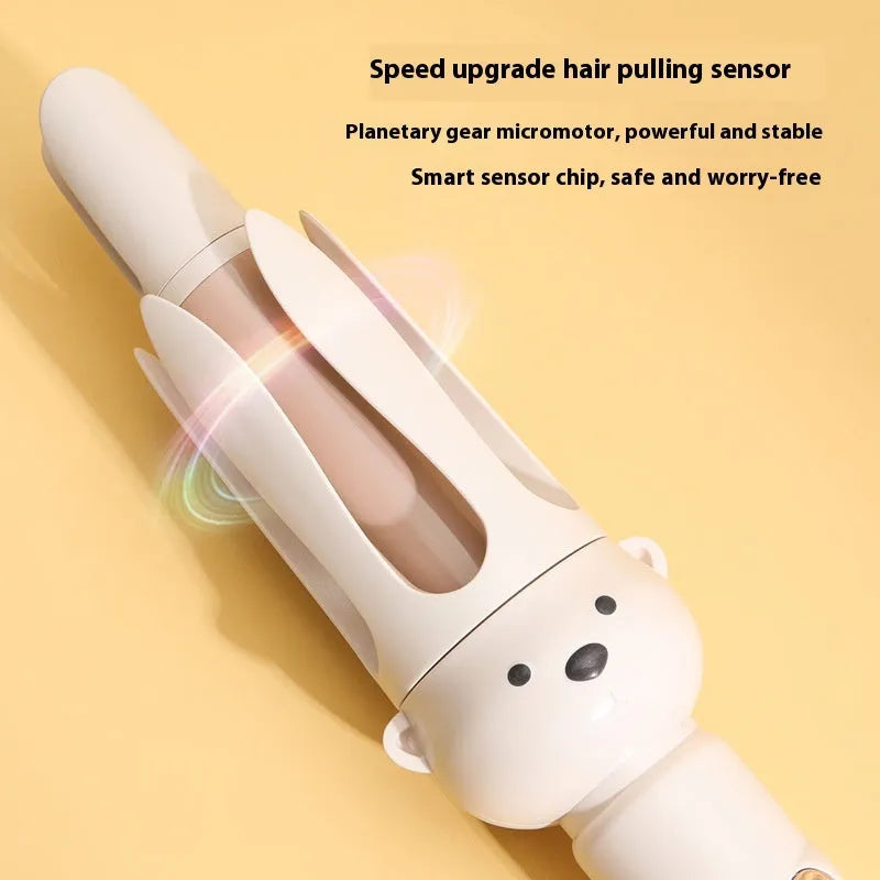 Beige anion automatic hair curler with UK plug on a styling wand.