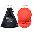 Orange natural rubber golf training mat for swing practice with centre of gravity design