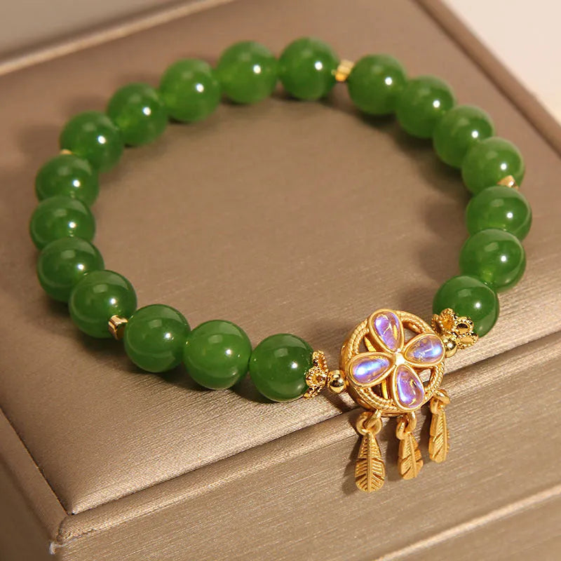 Green jasper crystal bracelet with four-leaf clover dream catcher pendant for women.