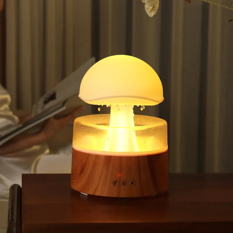 White cloud-shaped humidifier with raindrop simulation and seven-colour lighting, 500ml capacity