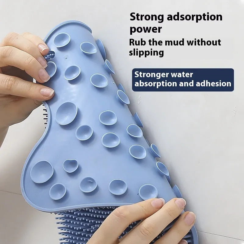 Blue silicone bath massage mat measuring 31cm by 32cm with textured surface