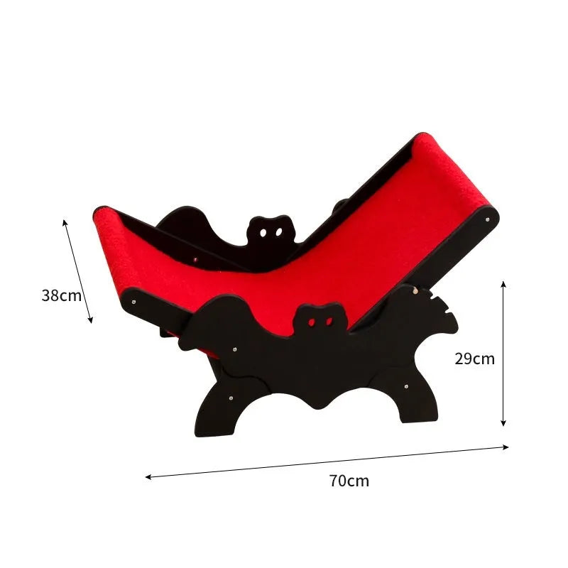 Wooden cat recliner bed with Halloween black and red design on raised platform