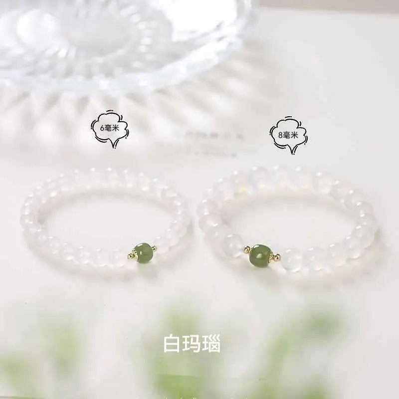 Handmade white agate and Hetian jade bracelet with crystal beads and cinnabar inlay detail