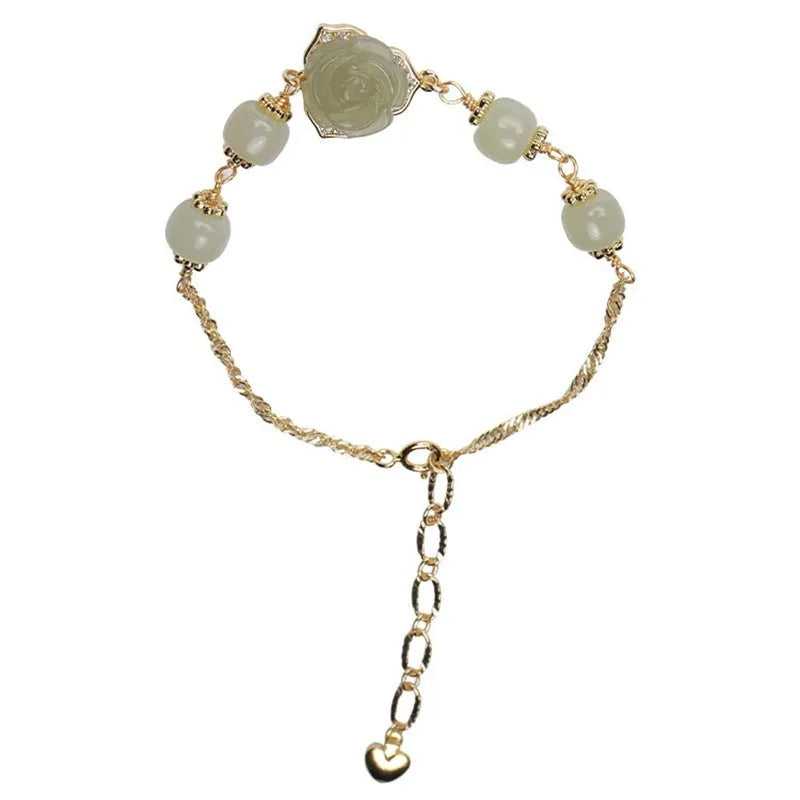 Women's bracelet with Hetian jade rose petals and 14K gold gilding in a floral design.