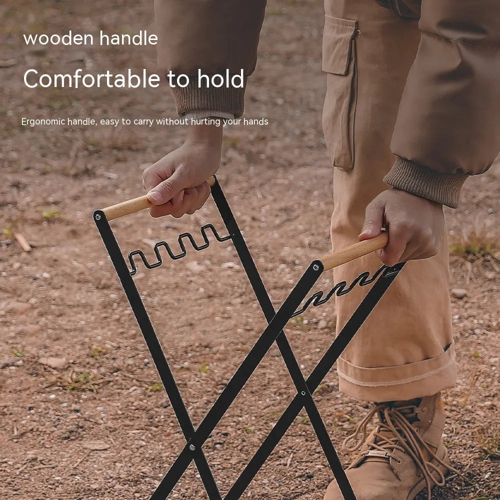 Black folding iron outdoor trash rack with a wooden handle holding a waste bag.