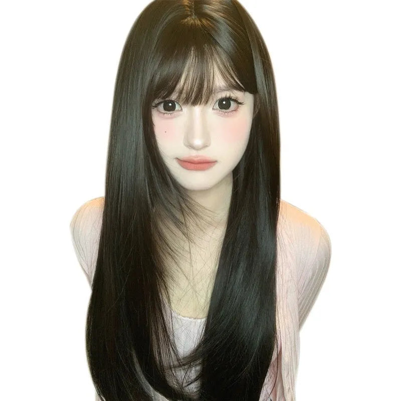 Dark brown full-head wig with long straight hair and bangs on display stand