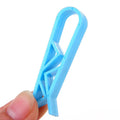 Pack of ten white plastic garbage bag fixing clips for the side of a trash can.