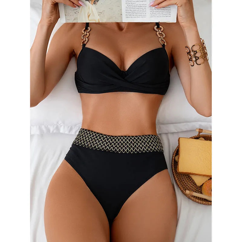 Black two-piece bikini swimsuit with sleeveless top and briefs on a mannequin