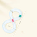 Blue and white cat turntable toy set with track balls and a feather teaser stick on a plain background.