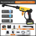 Green wireless high-pressure water gun with multiple nozzle attachments on a yellow toolbox