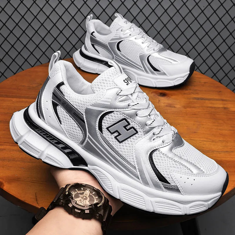 Men's mesh running shoes in black, white and gray, or white orange colours with plastic sole