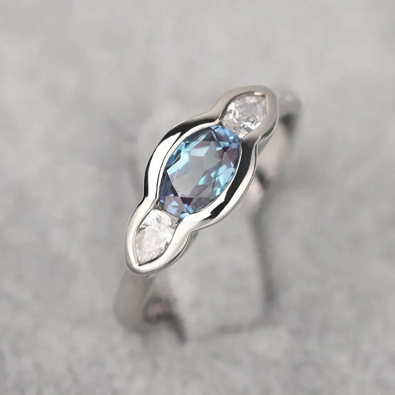 Geometric ellipse copper ring with zircon stone inlay and white gold finish
