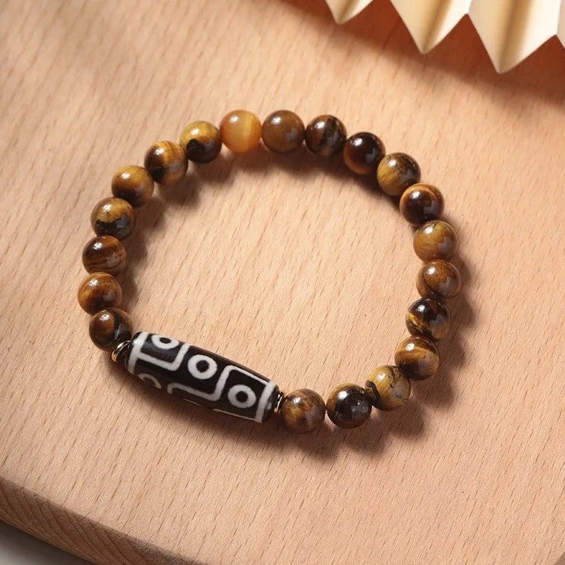 Tigereye bead Buddha rosary bracelet in a single circle ethnic style, showing simple and dzi bead colour options.