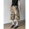 Men's bright yellow snake pattern camouflage jeans with cropped leg and tooling detail