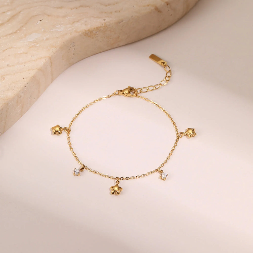Women's stainless steel bracelet with 18K gold plating and hexagonal star zircon pendant