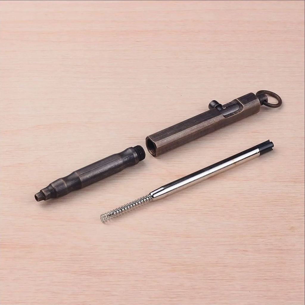 Brass tactical pen with hexagonal bolt design showing brass and black colour options