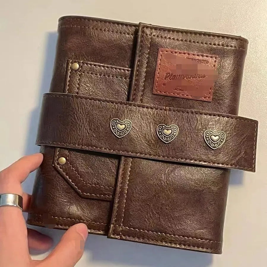 Brown retro leather buckle notebook with loose-leaf binding and A7 size dimensions