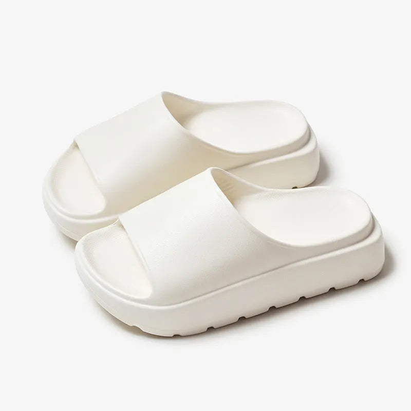 Women's beige fish mouth design EVA foam slippers with a thick 5.5cm sole.