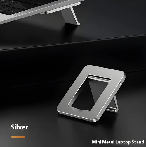 Aluminum alloy foldable laptop bracket shown in silver colour beside measuring tape showing 4.8cm width