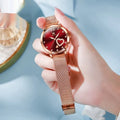 Women's fashion watch with mesh strap showing rose gold case and coloured dial options