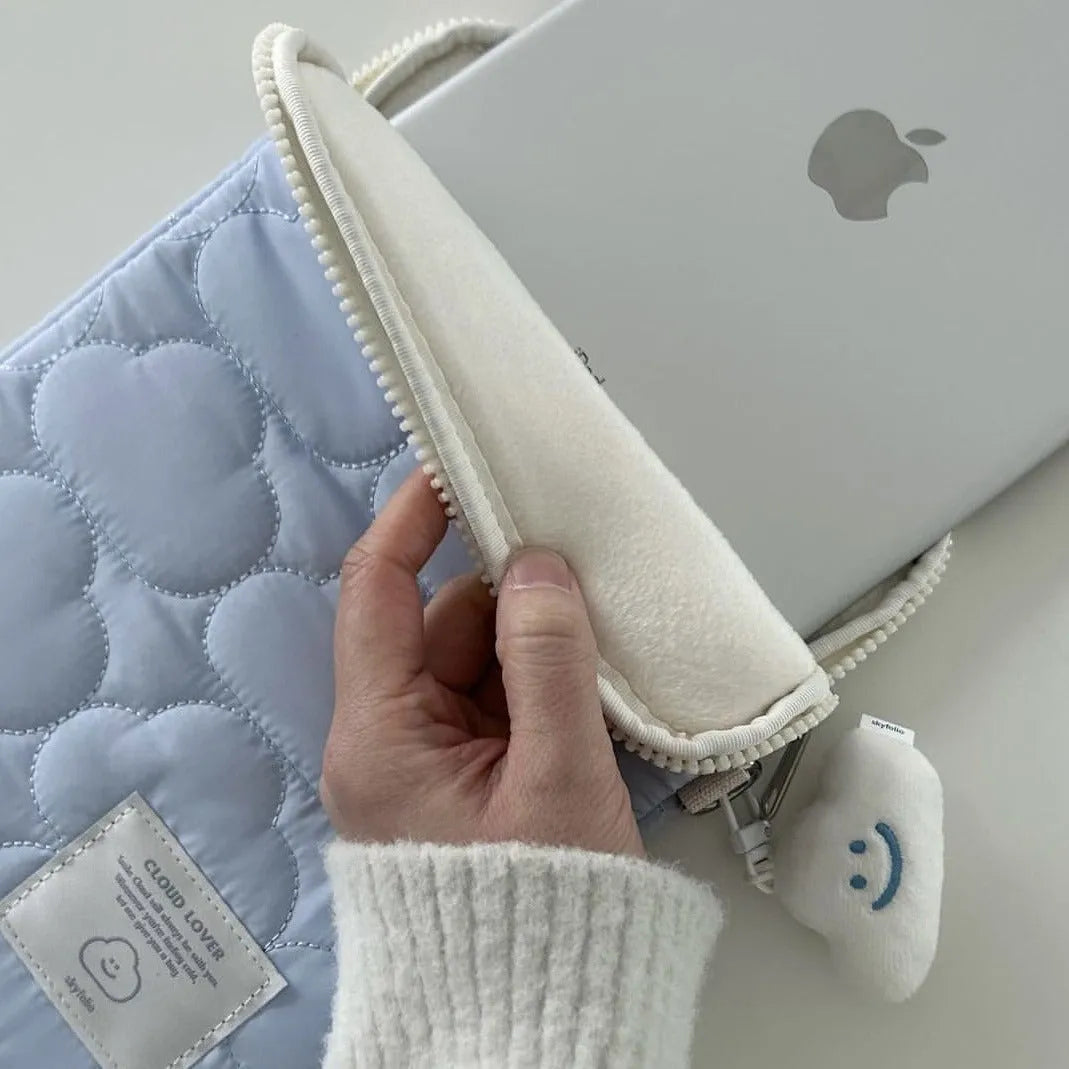 Cotton laptop sleeve with cloud embroidery in white or blue for 11 inch, 13-14 inch, and 15-15.6 inch devices.