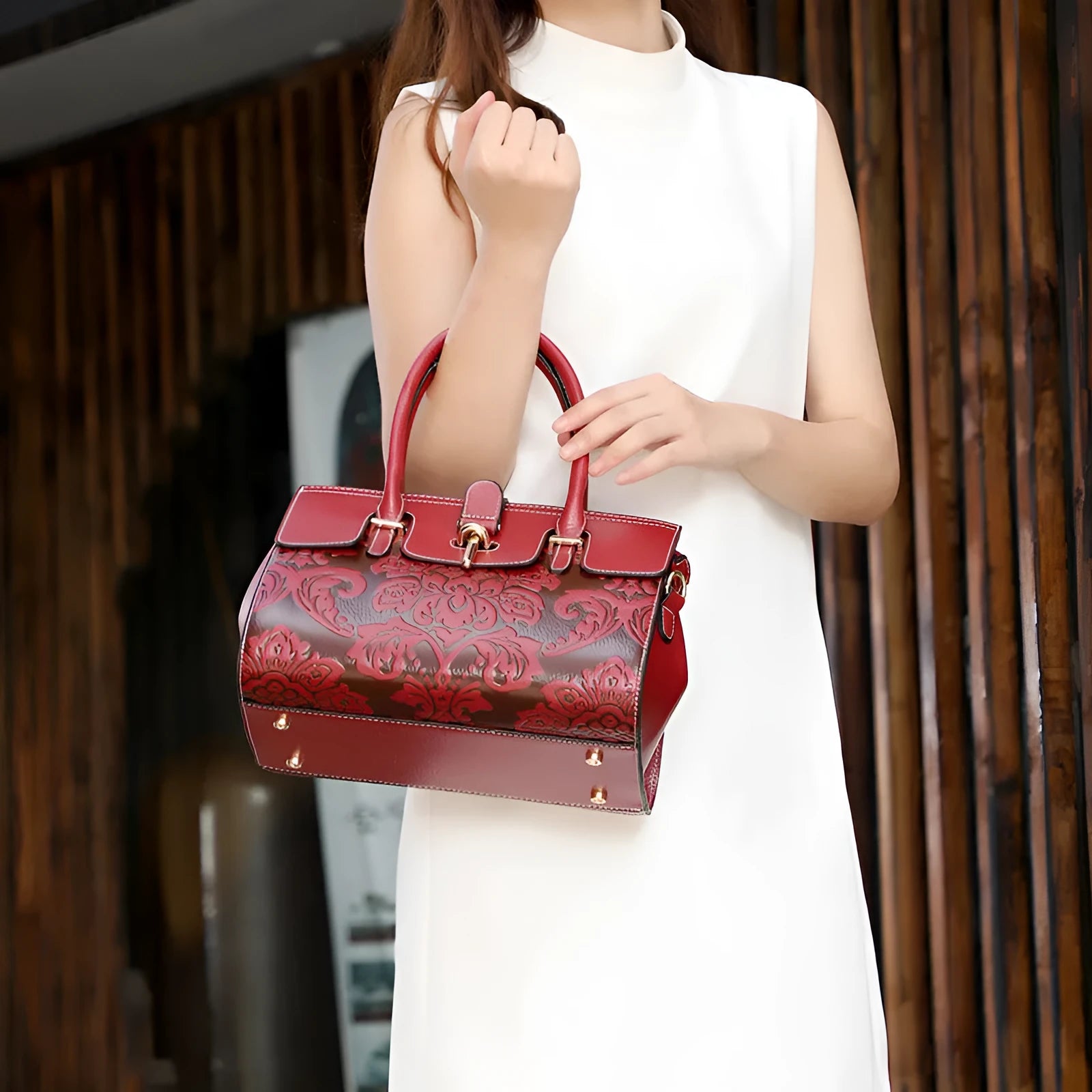 Vintage oval crossbody women's bag in genuine leather with embossed design and internal compartments