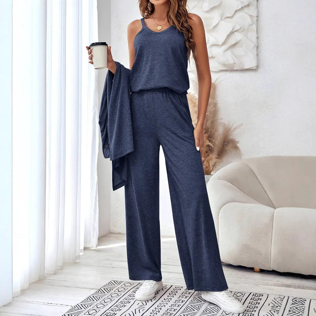 Blue women's three-piece casual suit with cardigan, top, and trousers on a hanger.