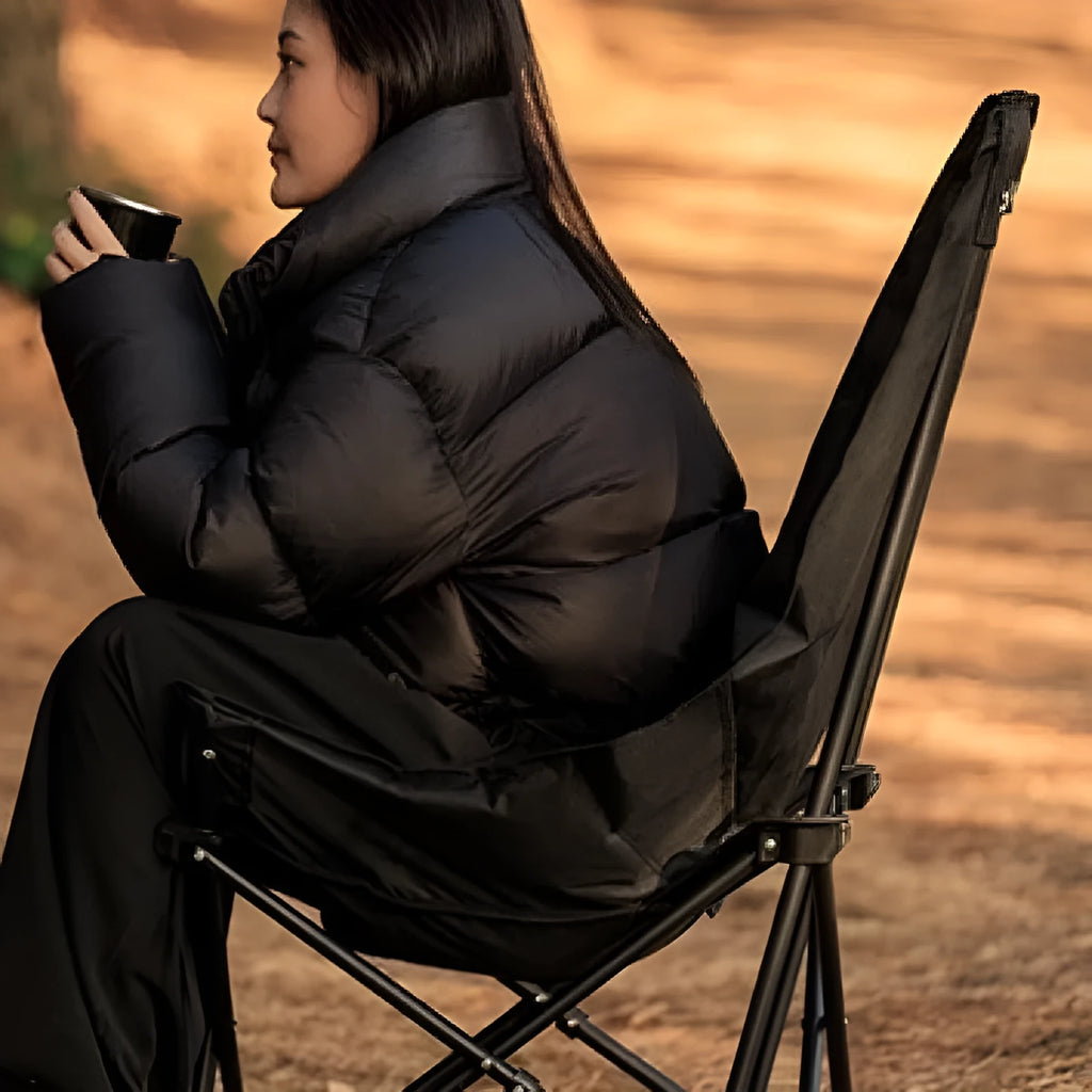 Night black Oxford cloth folding moon chair with thickened padding shown in folded and open positions