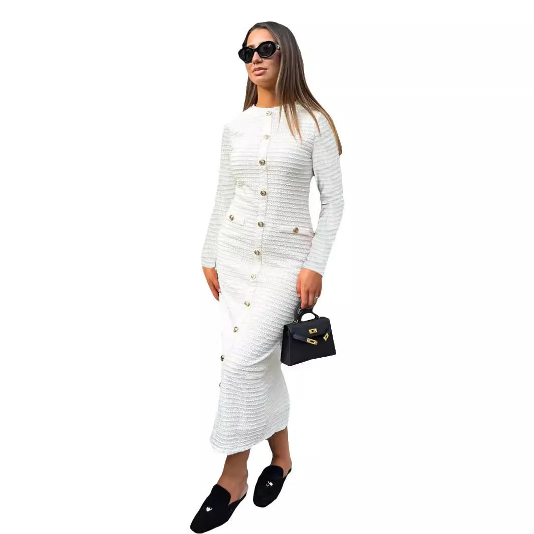 French retro slim fit knitted long-sleeved dress in black with button detail.