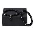Natural stone couple bracelet set showing two matching bracelets with heart-shaped polished stone pendants