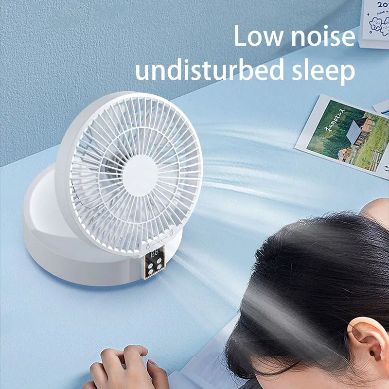 White portable folding fan with remote control shown in desktop and wall-mounted positions