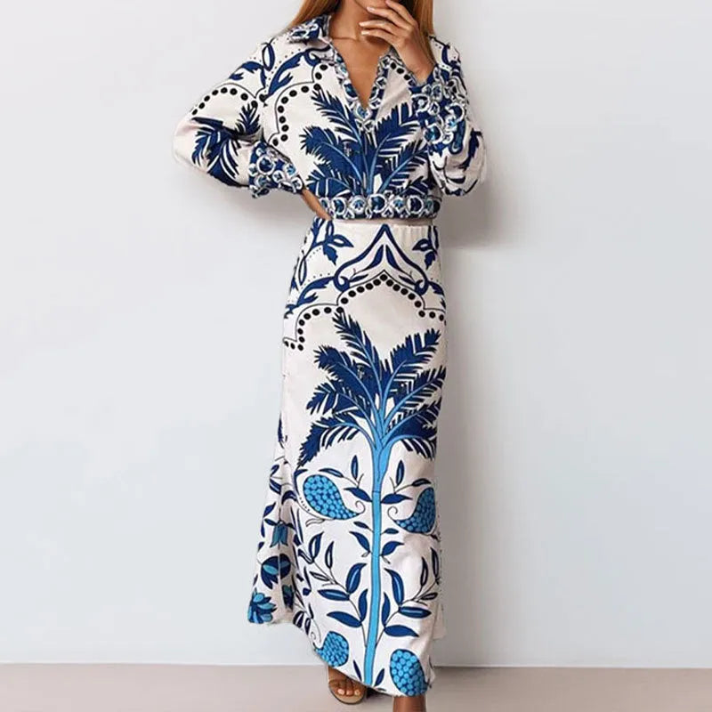 Women's long sleeve top and long skirt two-piece co-ord set in a solid colour.