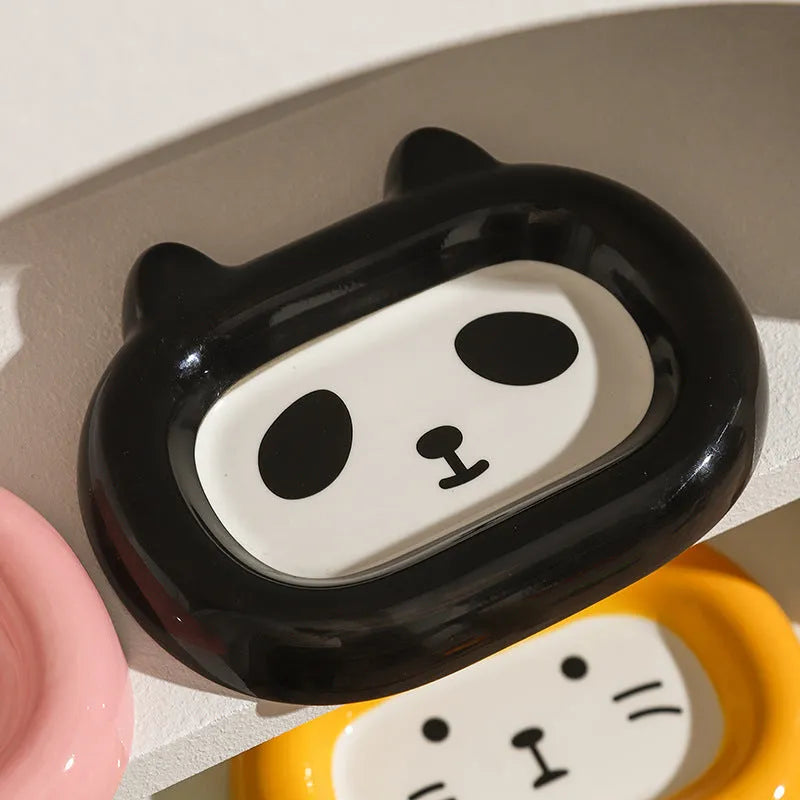 Ceramic pet bowl with an animal design, suitable for cat food or dog water.