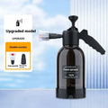 Black hand-held foam watering can with switch lock and two nozzles for garden and vehicle use