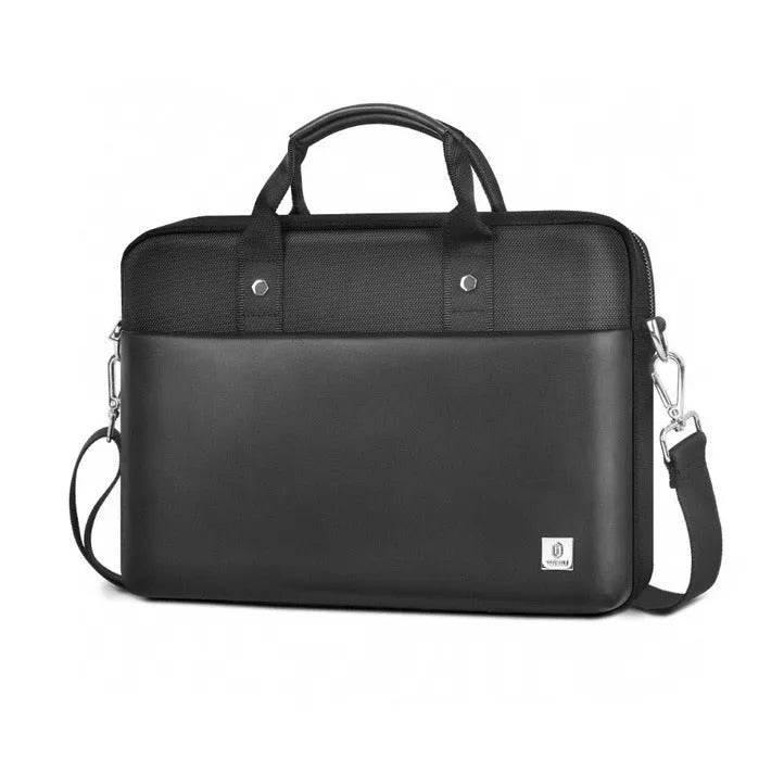 Black oxford cloth laptop handbag showing multi-pocket interior and separate padded computer compartment.