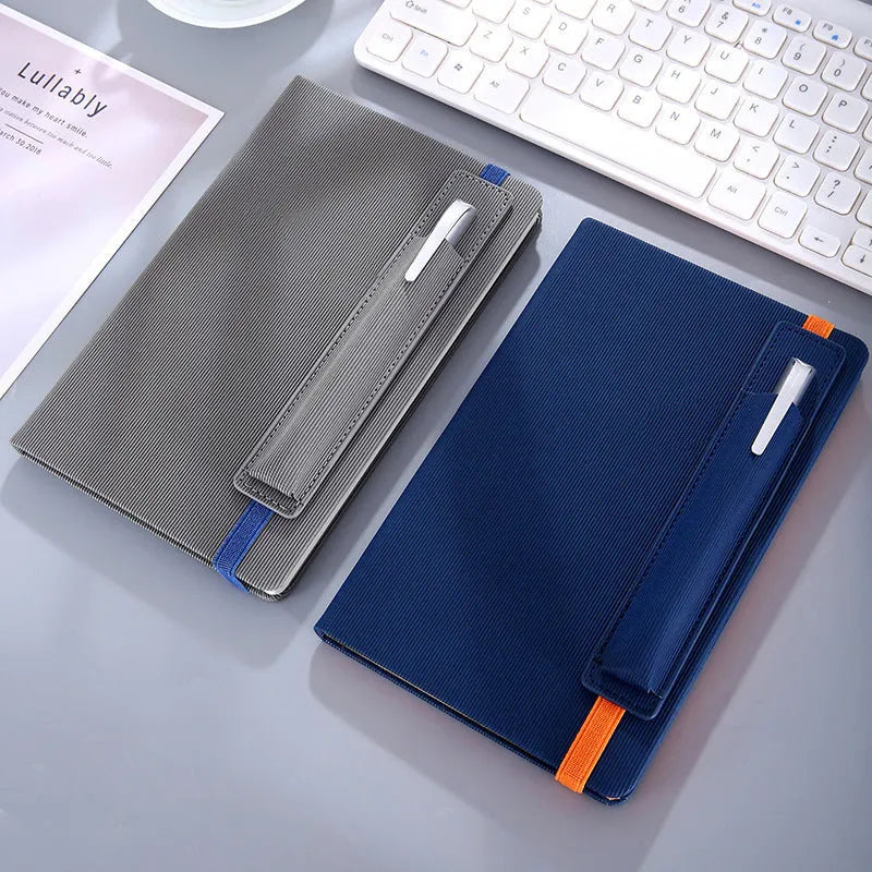 A5 faux leather notebook with pen insert and 200 sheets of 80gsm Dorian paper, shown in a choice of colours.