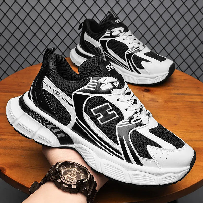 Men's mesh running shoes in black, white and gray, or white orange colours with plastic sole