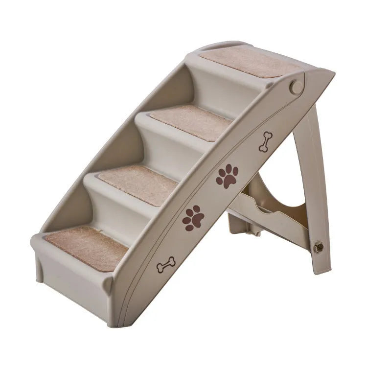 Foldable plastic pet stairs with non-slip surface in beige colour beside a sofa