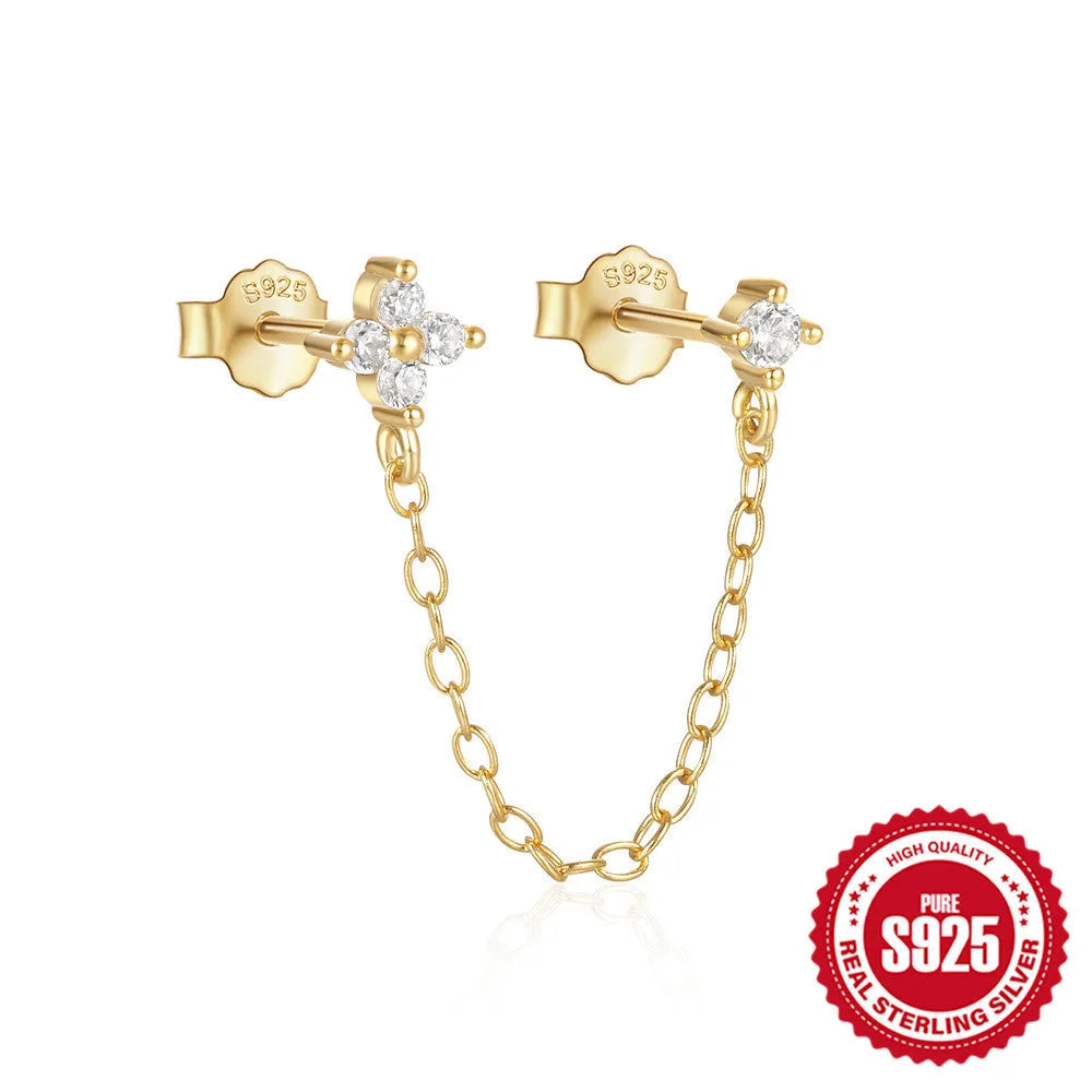S925 sterling silver ear stud with a geometric diamond flower design and delicate tassel chain detailing in a gold tone finish.