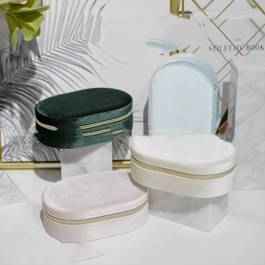 Oval velvet jewellery storage box with flannel interior in multiple colour options