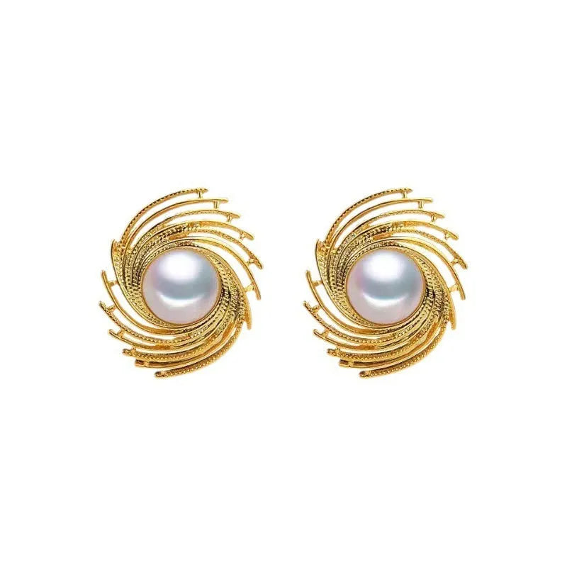 A pair of women's vintage-style alloy earrings with an irregular floral shape and a pearl electroplated colour.