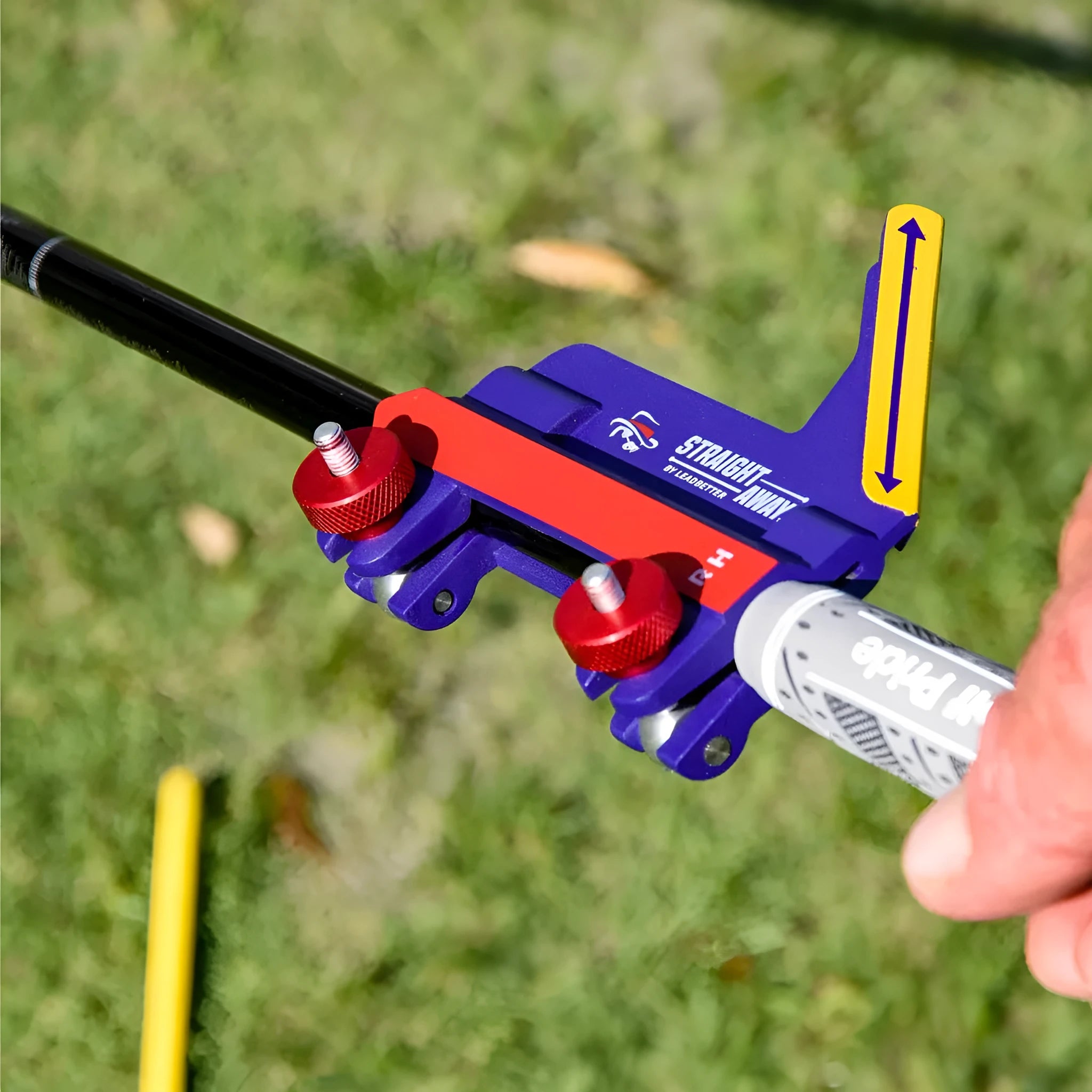 Plastic golf swing plane training aid shown on a solid background.