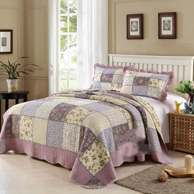 Pure cotton quilted bedspread three-piece set with pillowcases on a bed